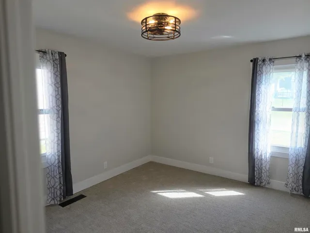 an empty room with a window