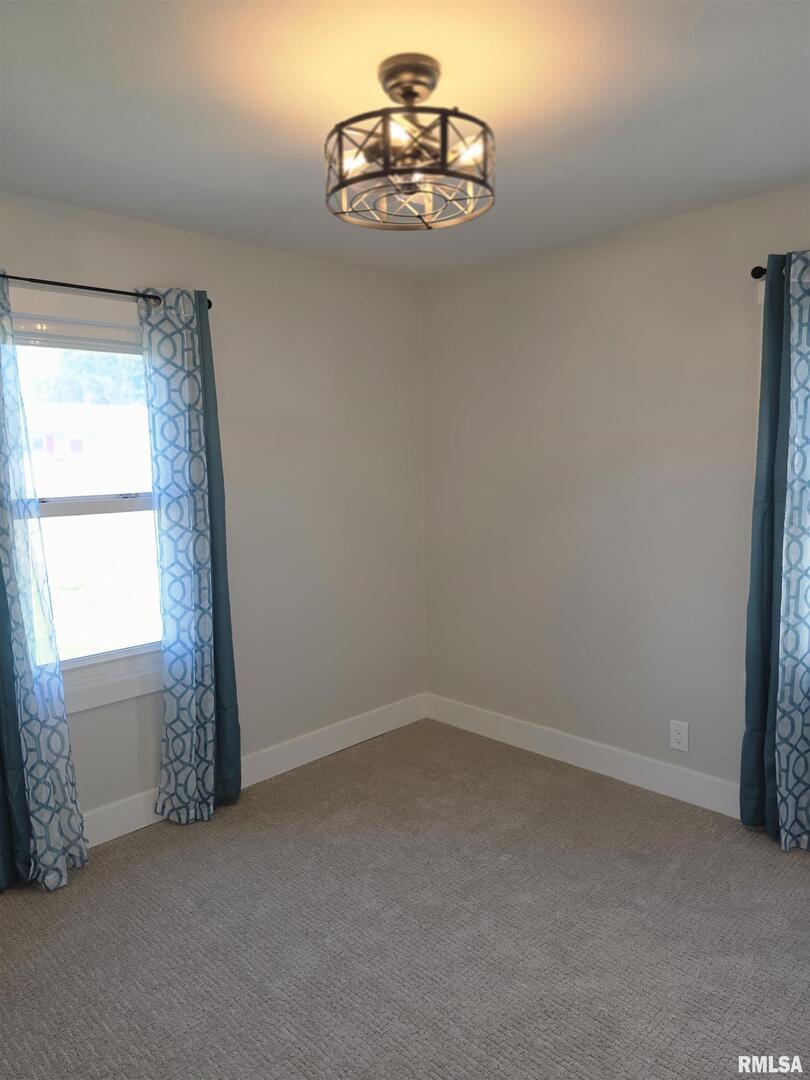 1031 Galbraith Drive Clinton, IA 52732 - Photo 30 of 35 an empty room with a window