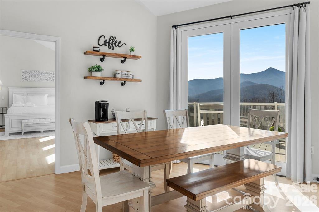 56 Great Horned Owl Road Candler, NC 28715 - Photo 7 of 32 a view of a dining room with furniture