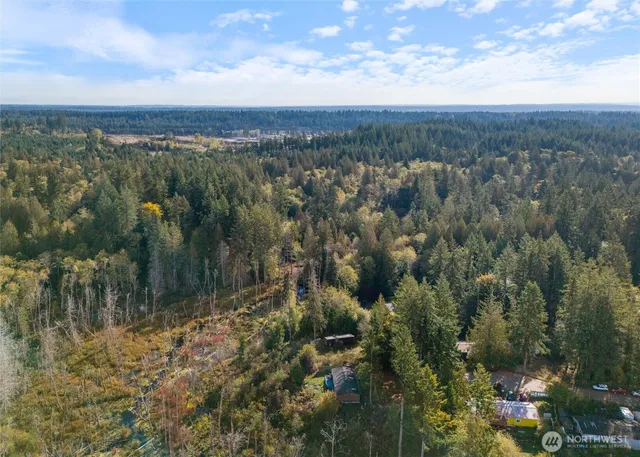 a view of lake with green space