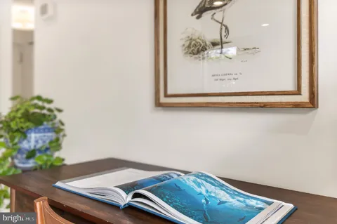 a view of a small space with wooden floor