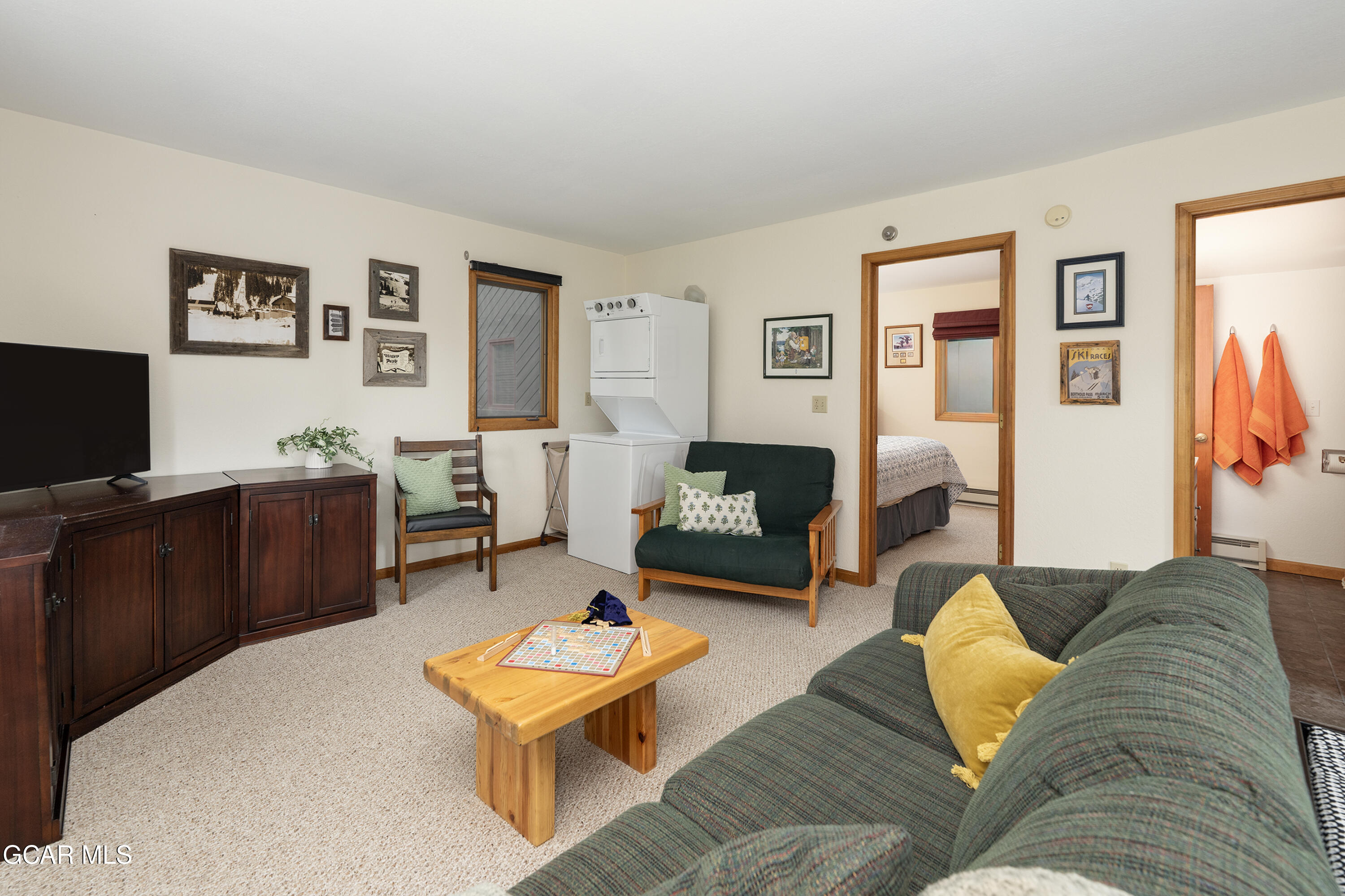 820 Wolverine Lane, Unit 3 Fraser, CO 80442 - Photo 26 of 43 a living room with furniture and a flat screen tv