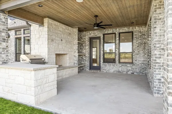 a view of an entryway with a fireplace
