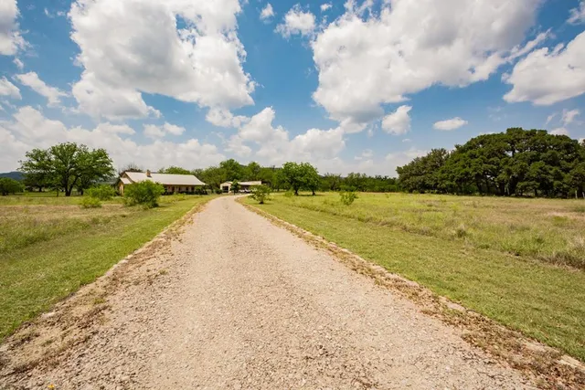 a view of an swimming pool and a yard