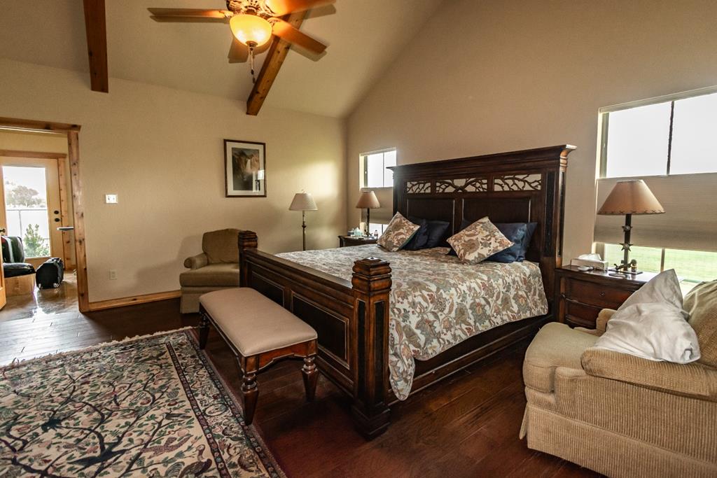 2657 West Sabinal Road Utopia, TX 78884 - Photo 29 of 36 a bedroom with a bed and a couch