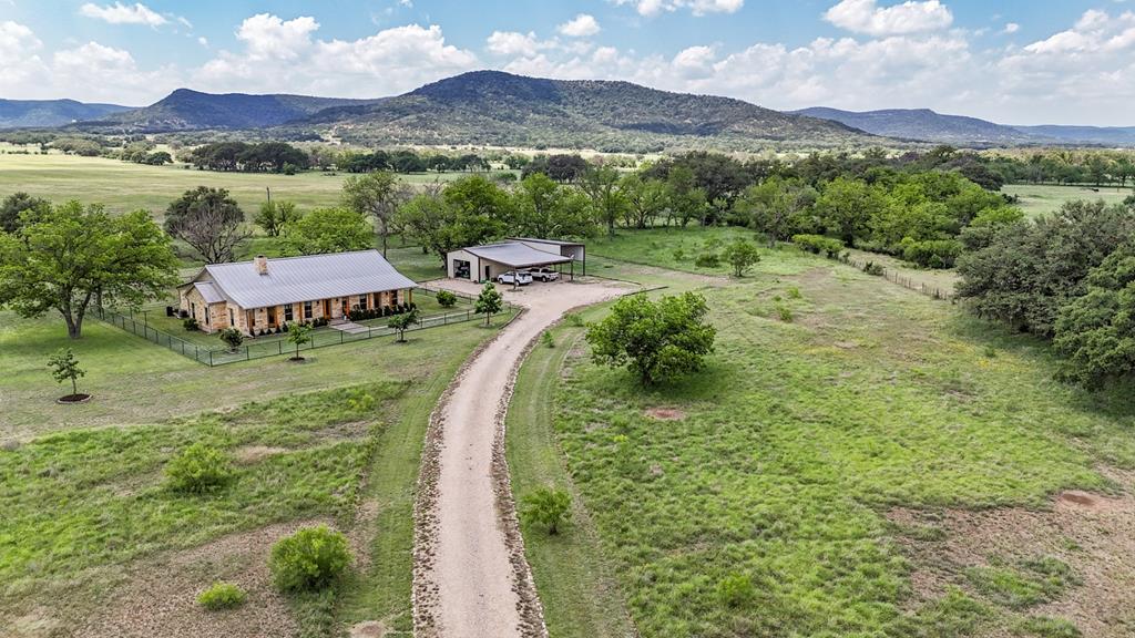 2657 West Sabinal Road Utopia, TX 78884 - Photo 36 of 36 a view of a town with mountains in the background