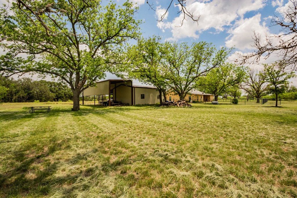 2657 West Sabinal Road Utopia, TX 78884 - Photo 8 of 36 a front view of house with yard and trees