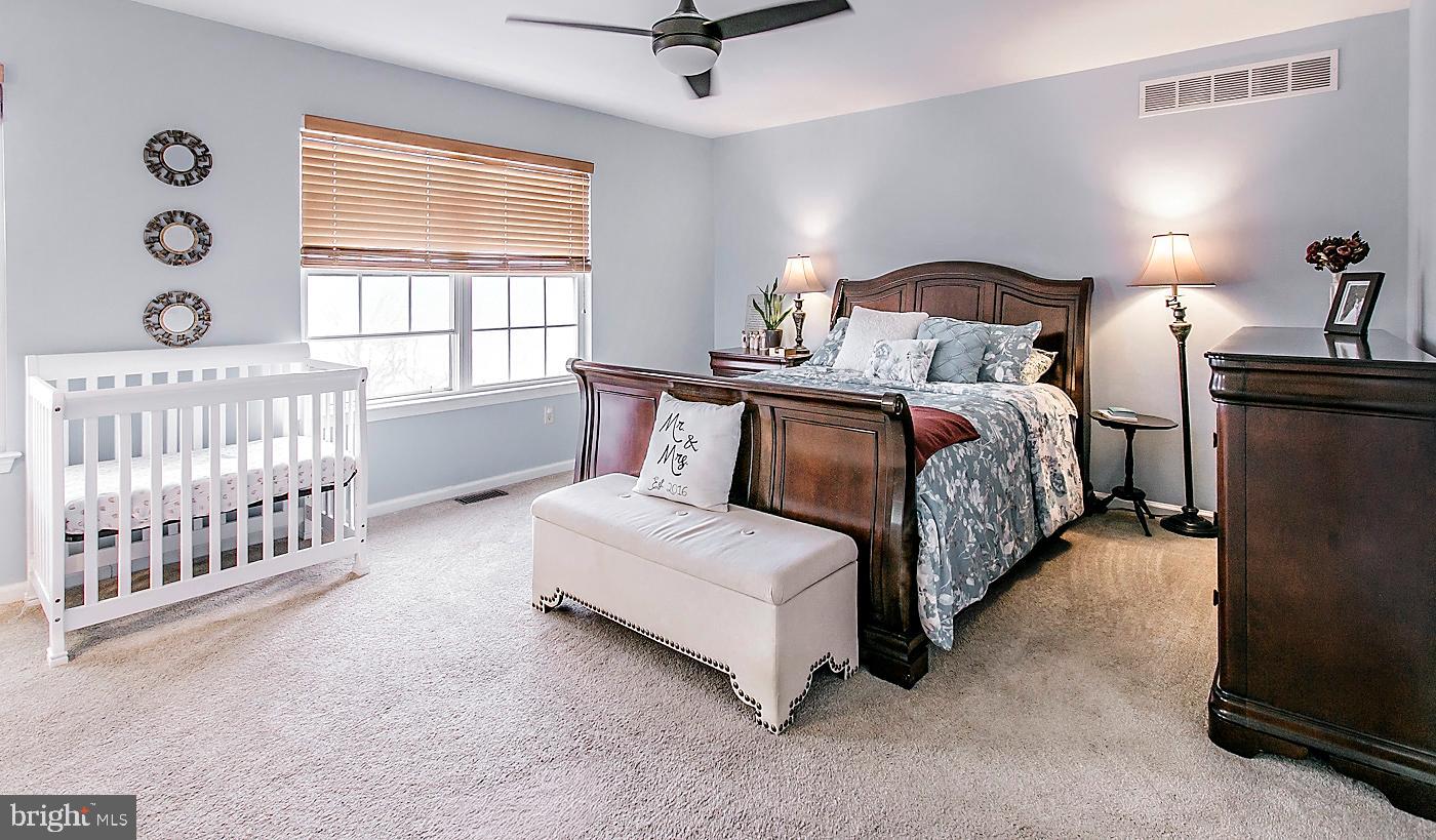 278 Ripka Street Philadelphia, PA 19127 - Photo 13 of 30 a bed room with a bed and a chair