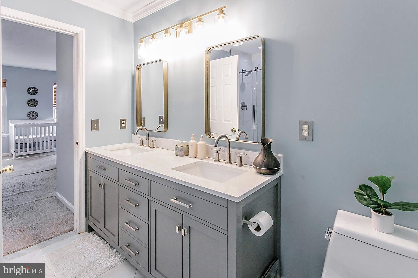278 Ripka Street Philadelphia, PA 19127 - Photo 17 of 30 a bathroom with a sink and a mirror