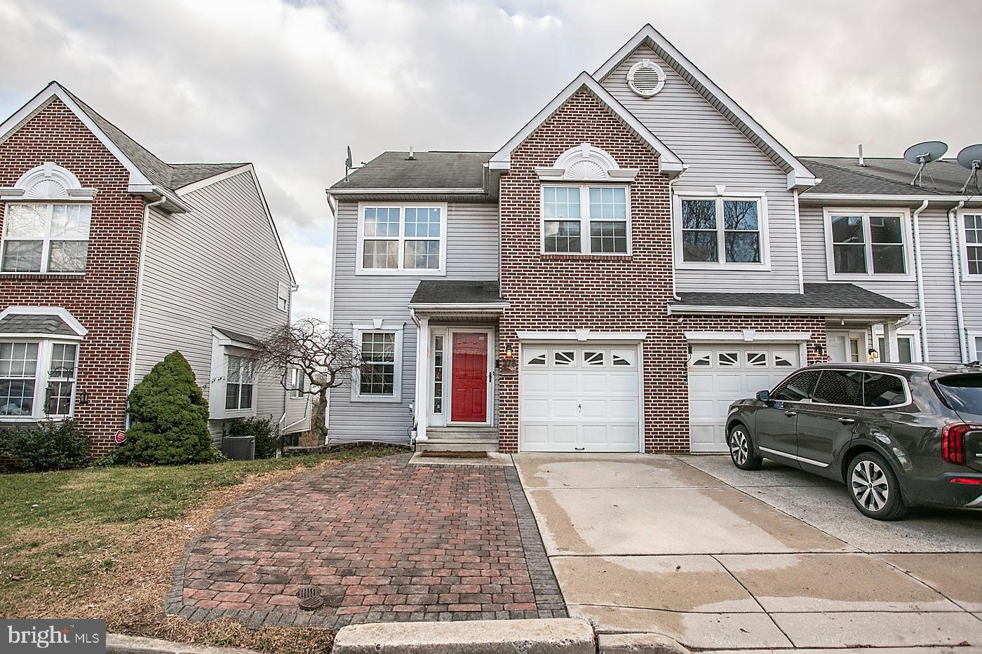 278 Ripka Street Philadelphia, PA 19127 - Photo 2 of 30 a view of a car parked in front of a brick house