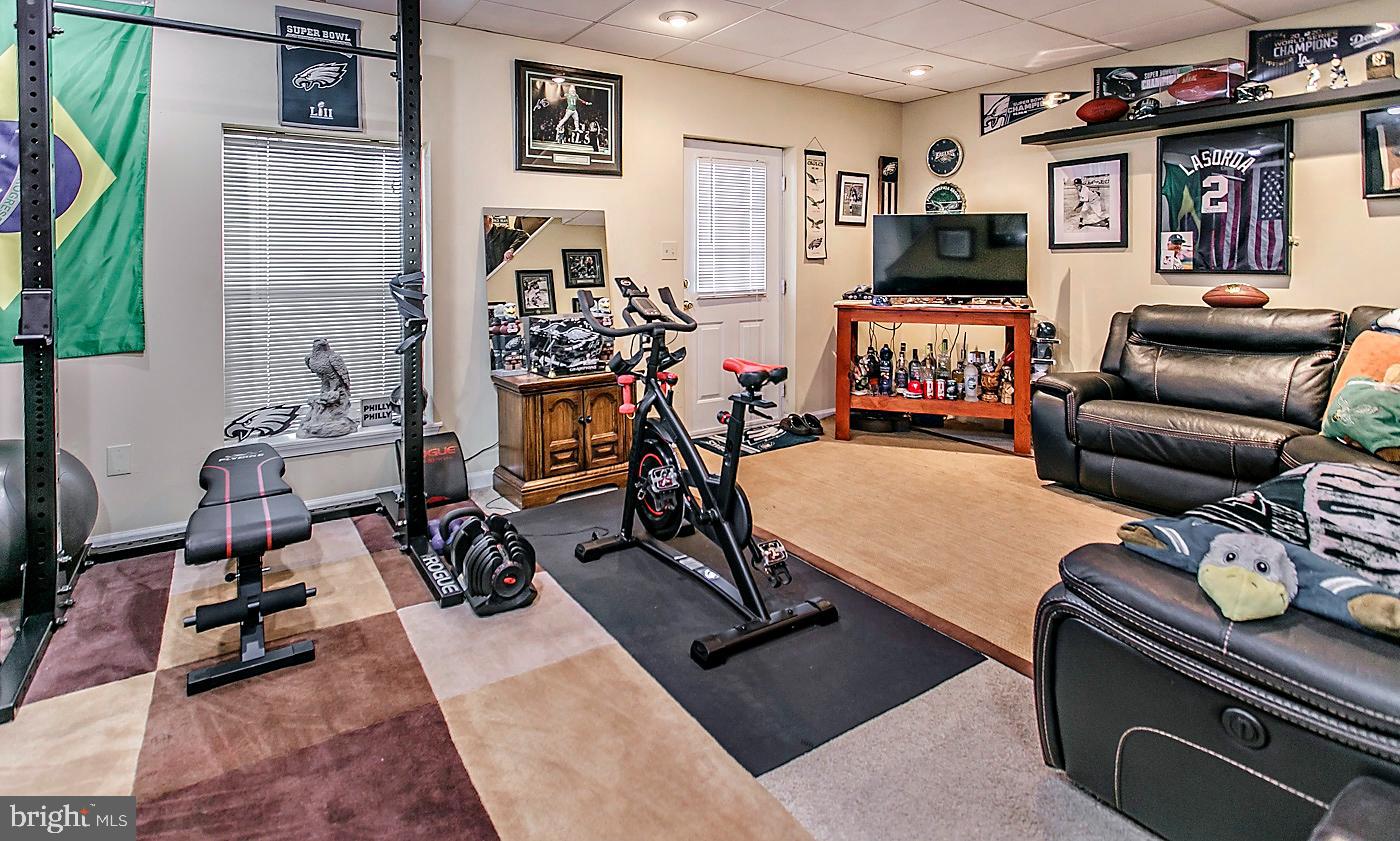278 Ripka Street Philadelphia, PA 19127 - Photo 22 of 30 a view of a livingroom with workspace and a couch