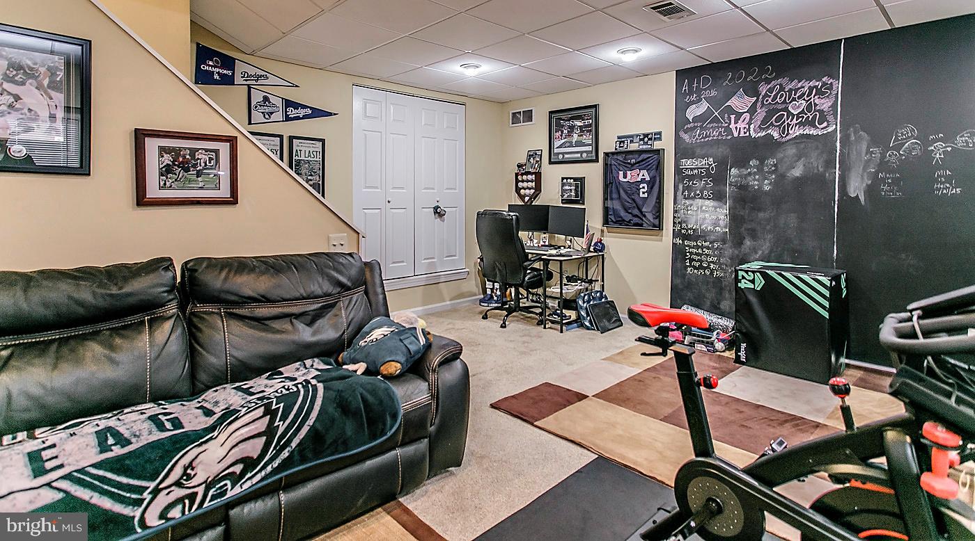 278 Ripka Street Philadelphia, PA 19127 - Photo 23 of 30 a living room with furniture and wooden floor