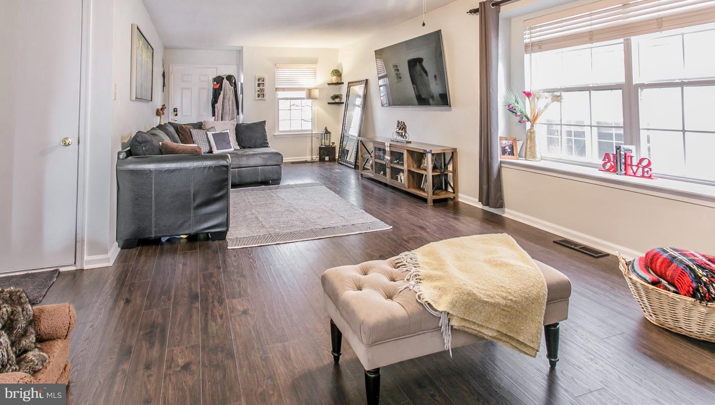278 Ripka Street Philadelphia, PA 19127 - Photo 5 of 30 a living room with furniture and a flat screen tv