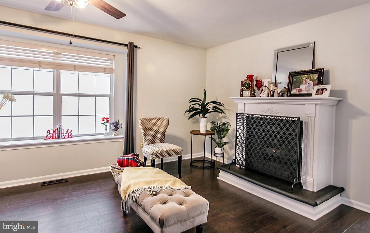 278 Ripka Street Philadelphia, PA 19127 - Photo 7 of 30 a living room with furniture and a fireplace
