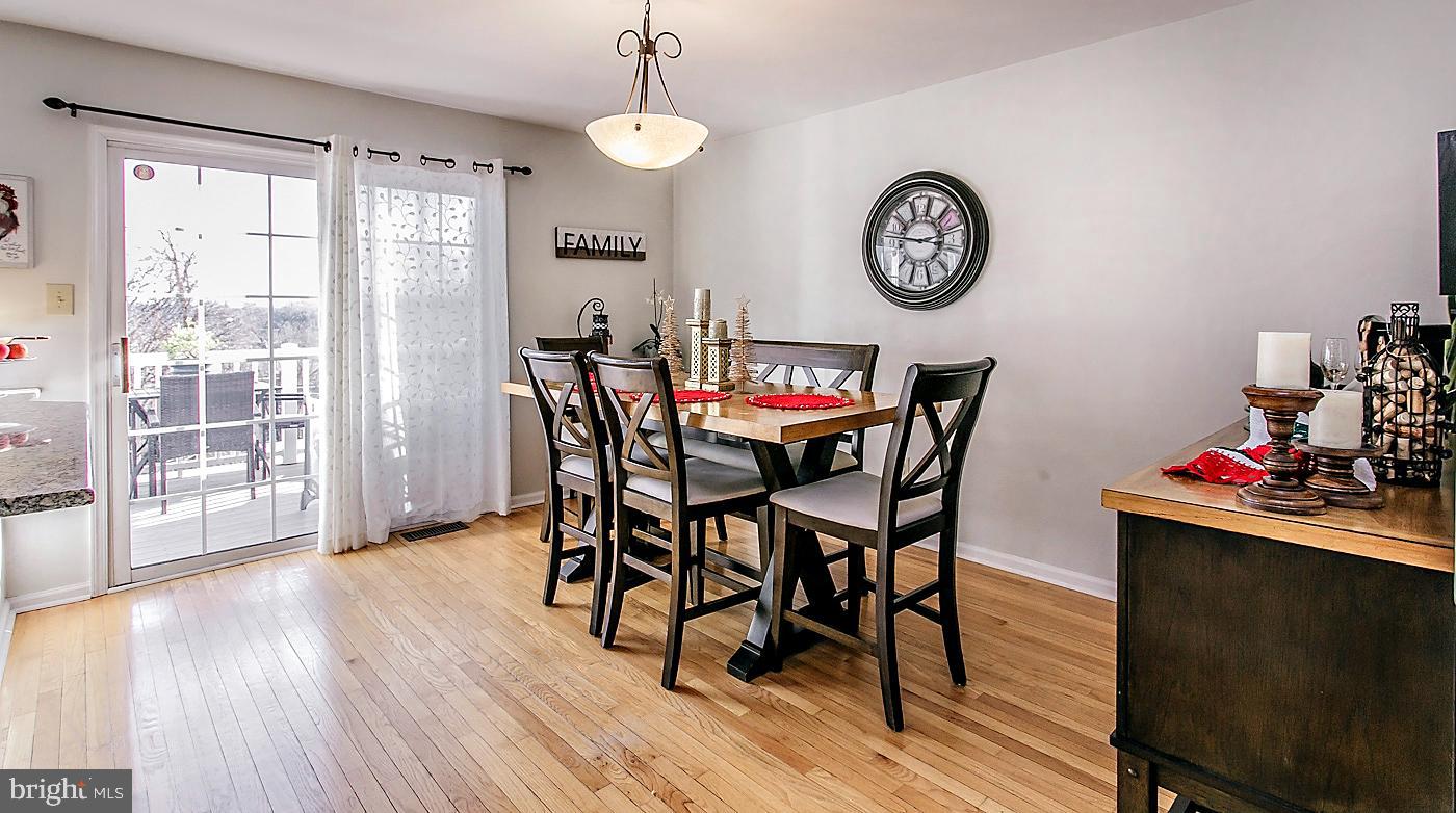278 Ripka Street Philadelphia, PA 19127 - Photo 10 of 30 a view of a dining room with furniture window and wooden floor