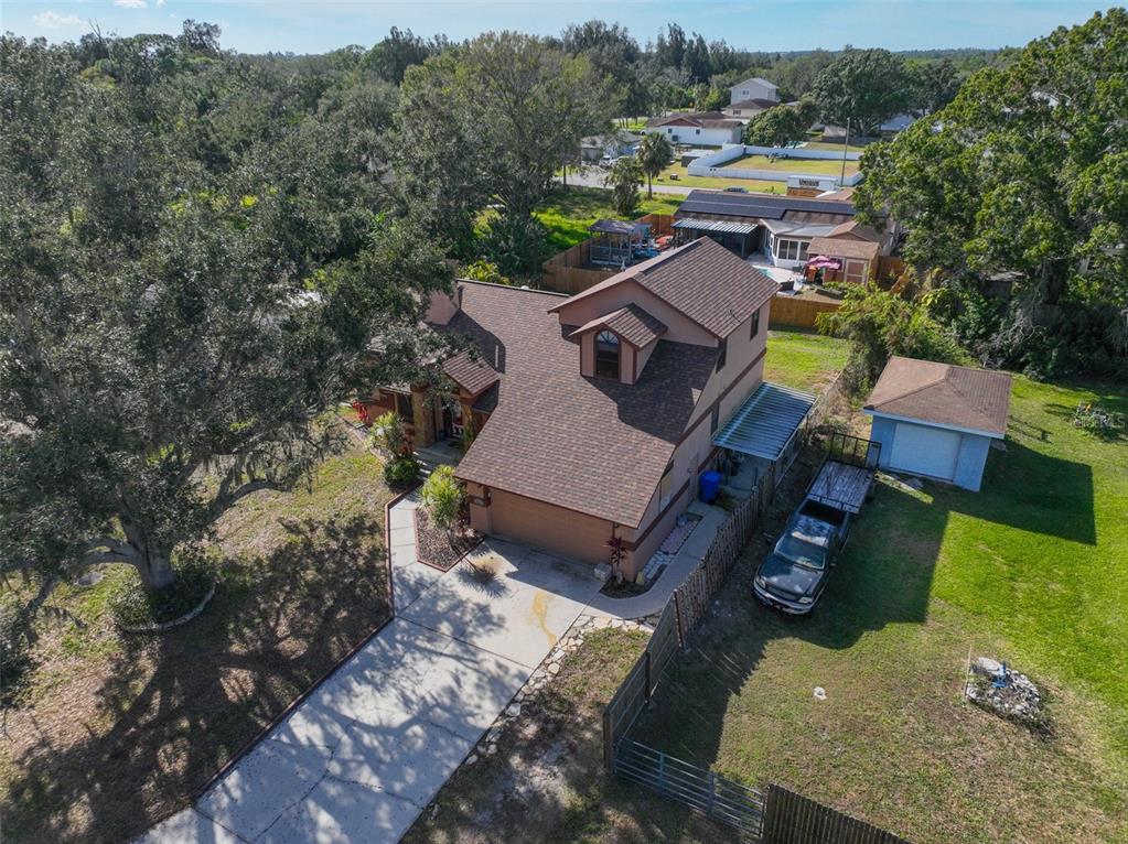 411 12th Street Southwest Ruskin, FL 33570 - Photo 6 of 33 an aerial view of a house with a yard