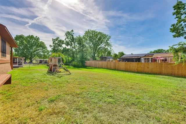 a view of a backyard with a garden