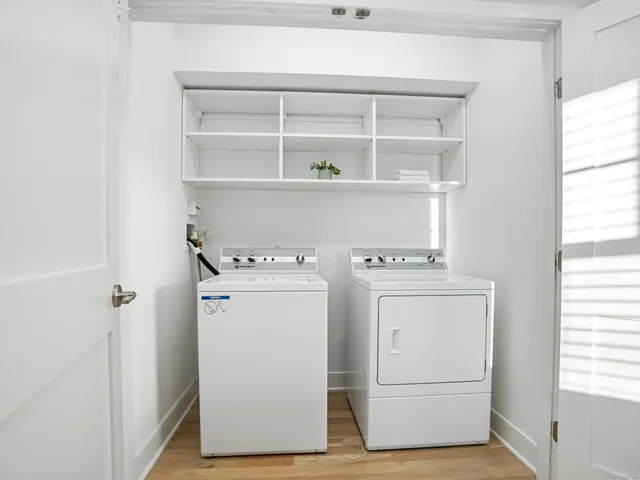 a utility room with dryer and washer