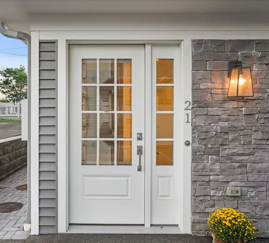 a view of front door of house with a window