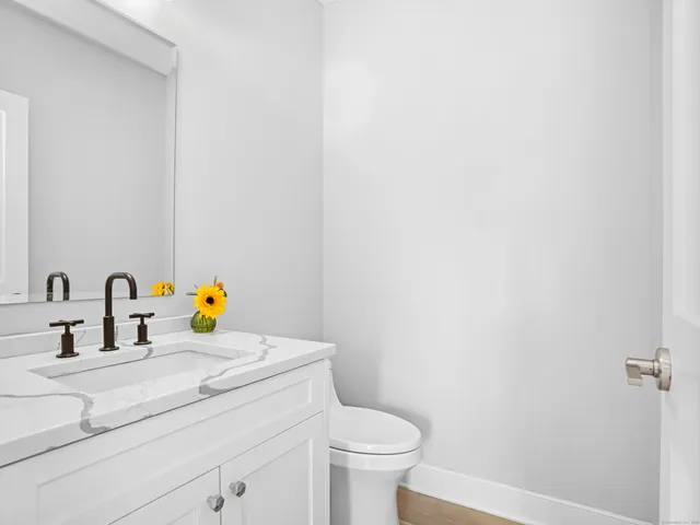 a bathroom with a sink and a toilet