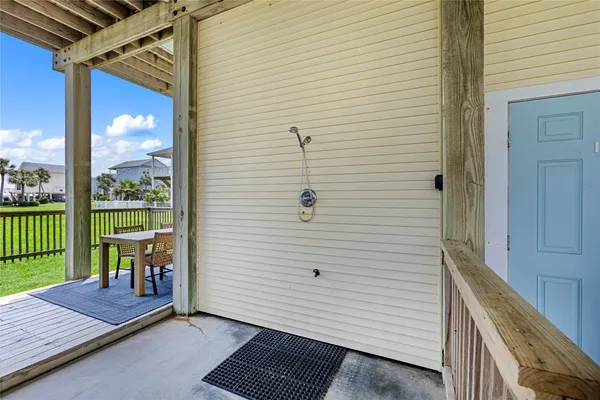 a view of a balcony with chairs