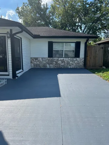 a front view of a house with garage
