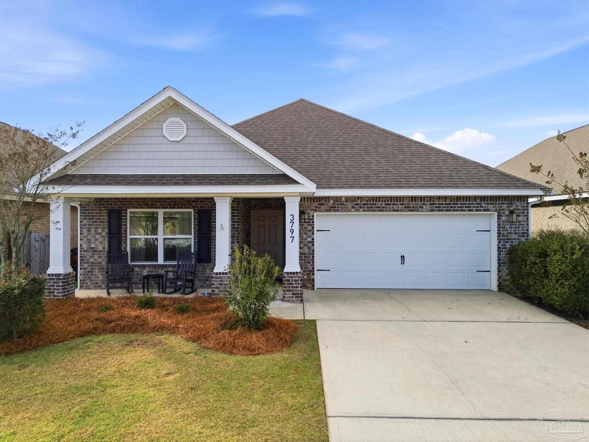 3797 Hawks Landing Circle Pace, FL 32571 - Photo 1 of 26 a view of a house with patio