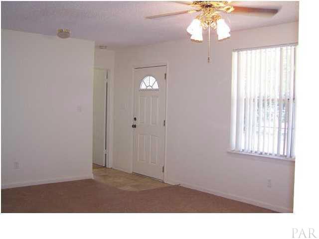 5376 Persimmon Hollow Road Milton, FL 32583 - Photo 2 of 12 Entering the front door gives you just the amount of foyer area you need NOT to track your carpet up and convenience coat c