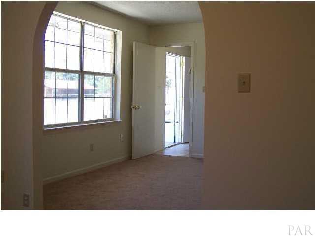 5376 Persimmon Hollow Road Milton, FL 32583 - Photo 3 of 12 Taking a RIGHT off the Foyer leads you directly into the Master bedroom which has the area for "an Office or Sitting room" also Master bathroom here. THEN...