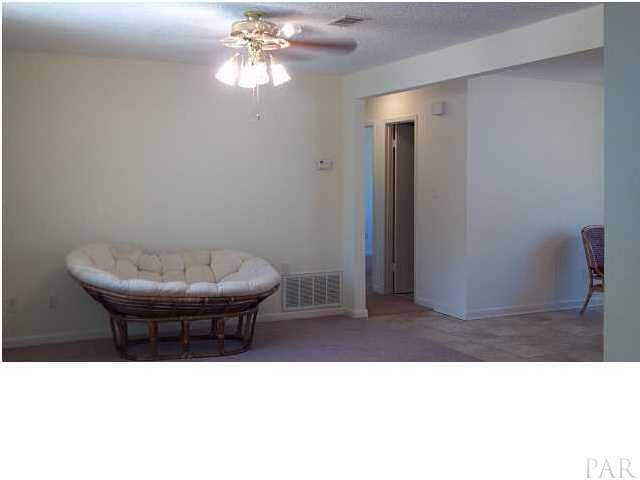 5376 Persimmon Hollow Road Milton, FL 32583 - Photo 5 of 12 Foyer then to your LEFT is a spacious living room... nice area to set up comfortable sectional and television cent
