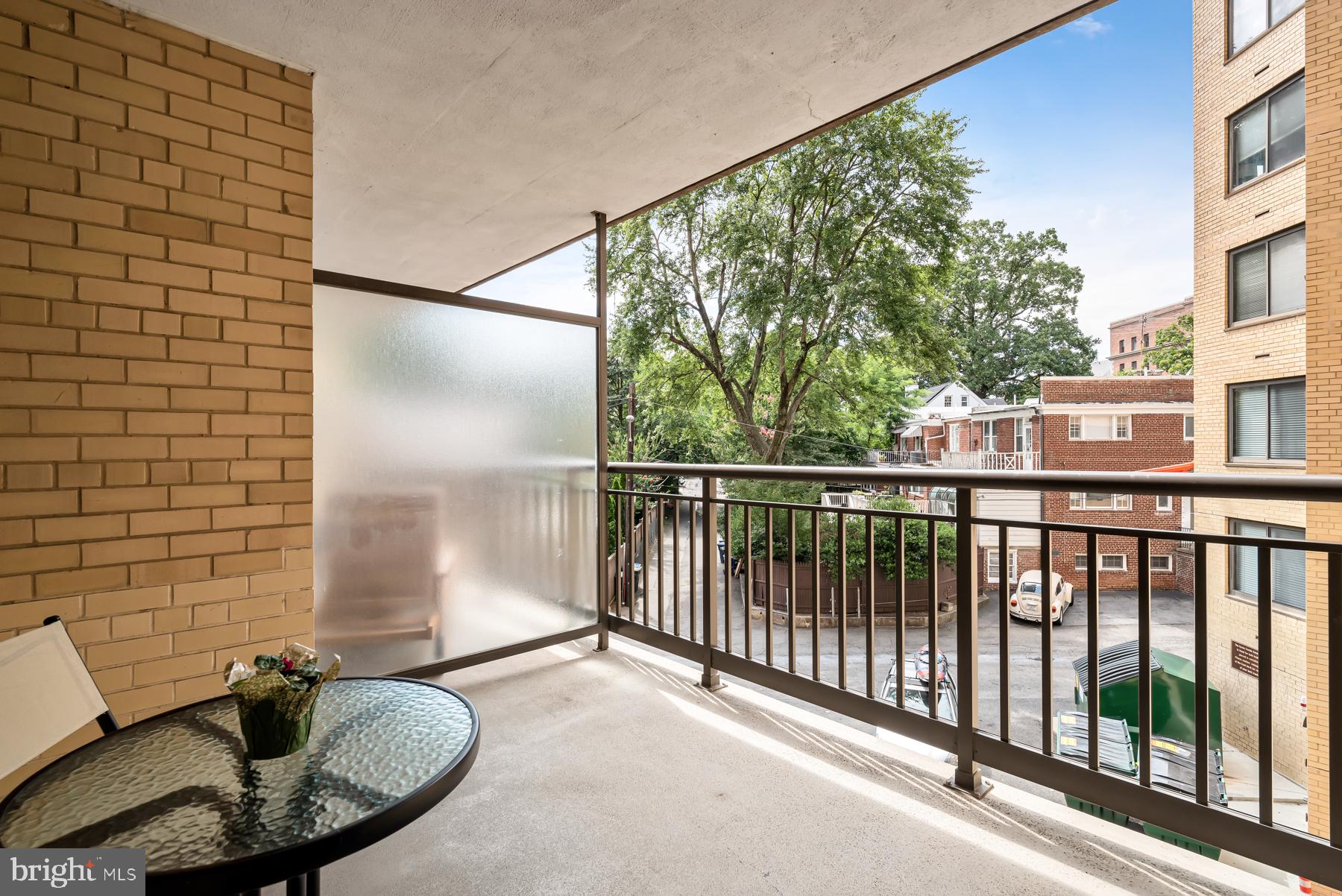 4740 Connecticut Avenue Northwest, Unit 414 Washington, DC 20008 - Photo 22 of 33 a view of a balcony with furniture