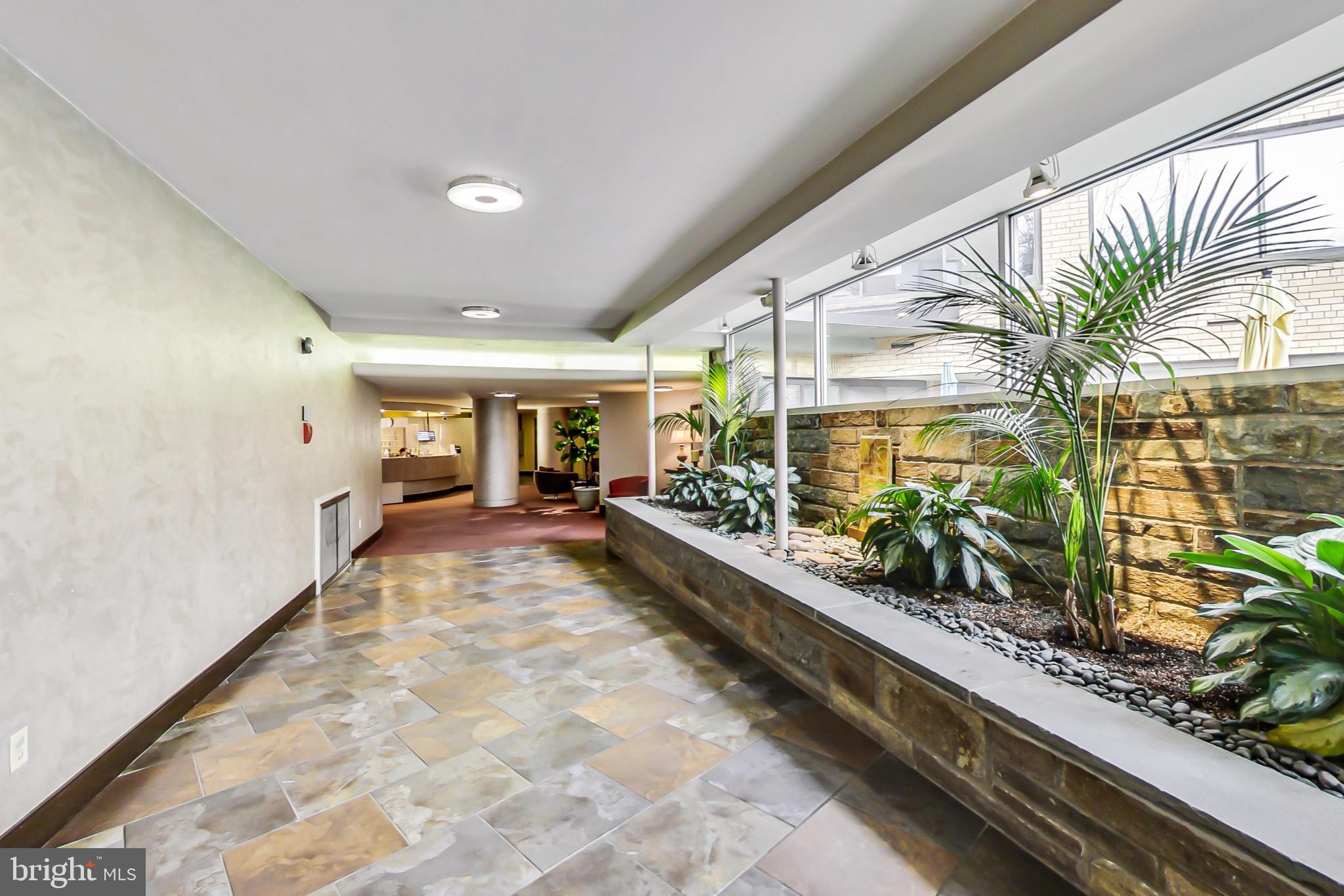 4740 Connecticut Avenue Northwest, Unit 414 Washington, DC 20008 - Photo 24 of 33 a very nice looking room with a large window