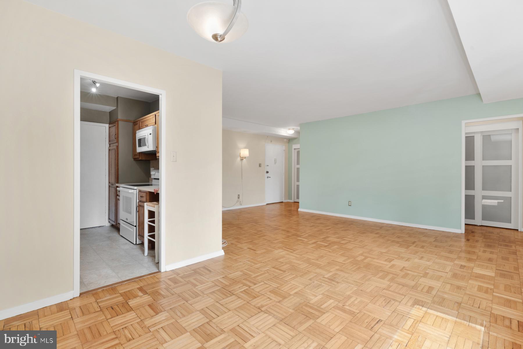 4740 Connecticut Avenue Northwest, Unit 414 Washington, DC 20008 - Photo 6 of 33 a view of a big room with closet and windows