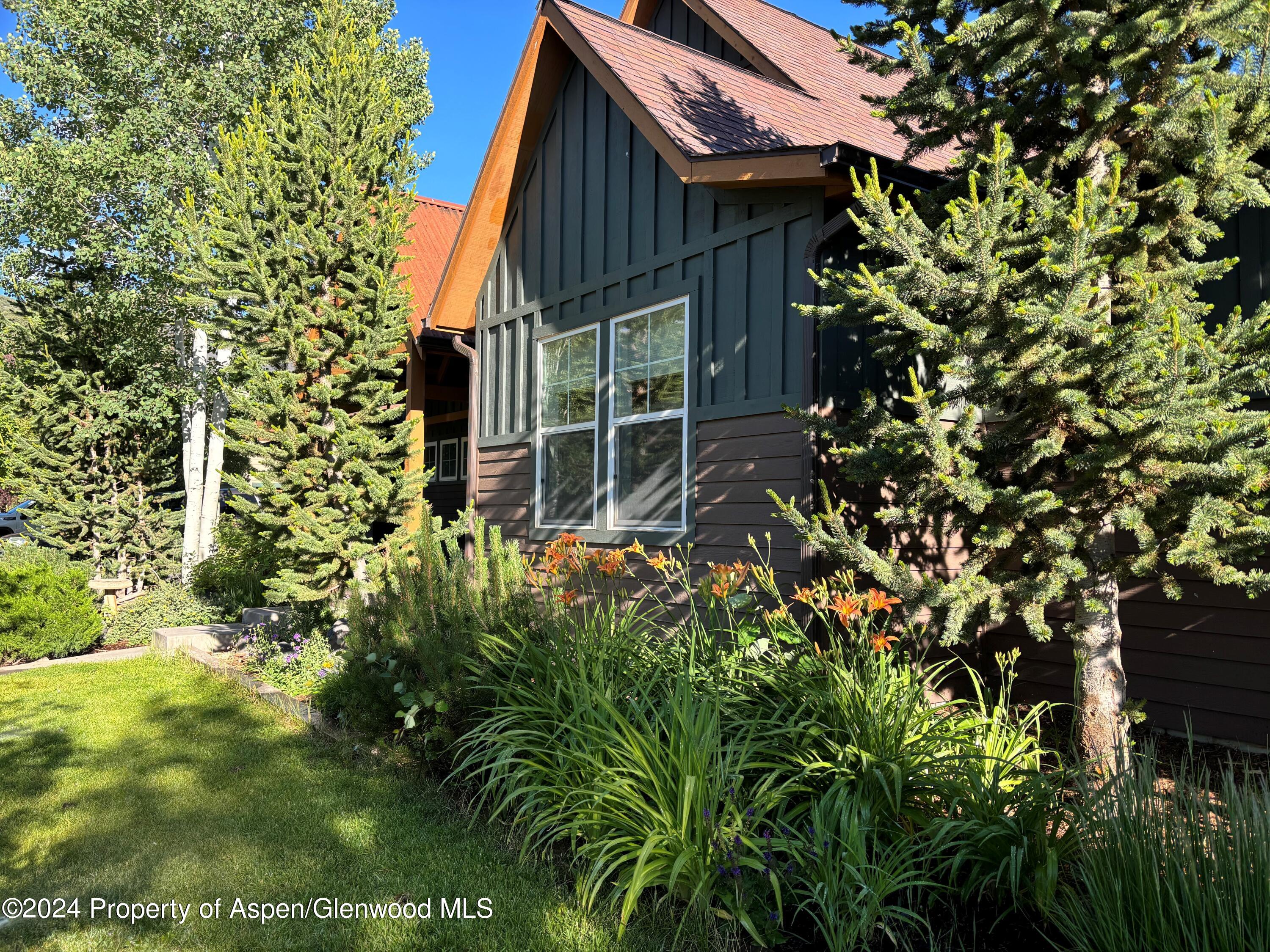 208 Juniper Court Basalt, CO 81621 - Photo 2 of 9 a view of a house with a tree