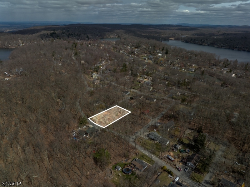 222 Acabonack Road Vernon, NJ 07422 - Photo 18 of 21 a view of a dry yard with wooden floor and fence