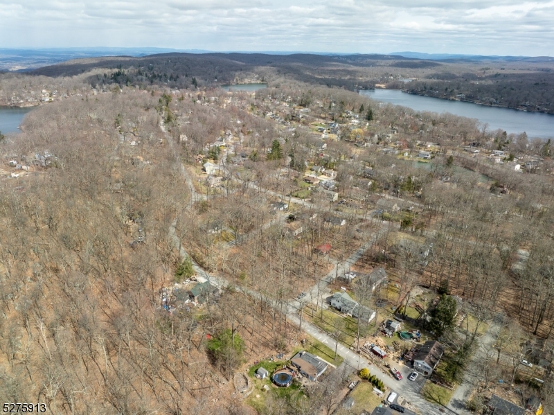 222 Acabonack Road Vernon, NJ 07422 - Photo 20 of 21 a view of a dry yard with wooden floor