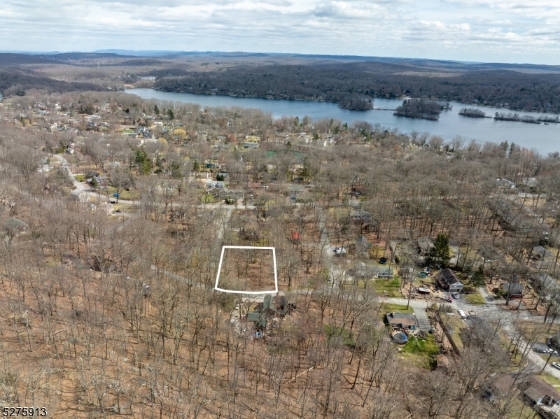 222 Acabonack Road Vernon, NJ 07422 - Photo 4 of 21 a aerial view of a beach