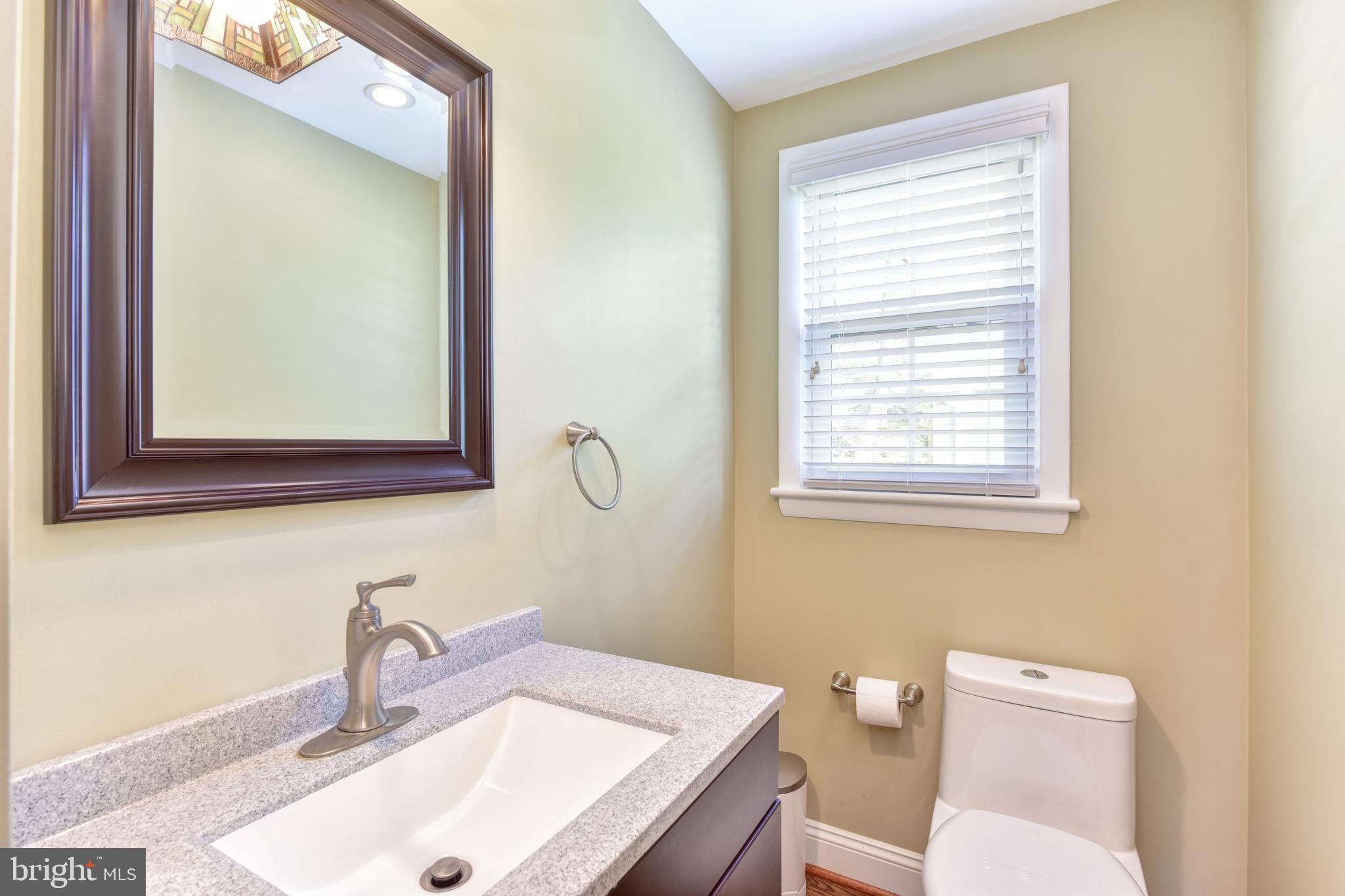 8332 Wagon Wheel Road Alexandria, VA 22309 - Photo 11 of 39 Powder room on main level