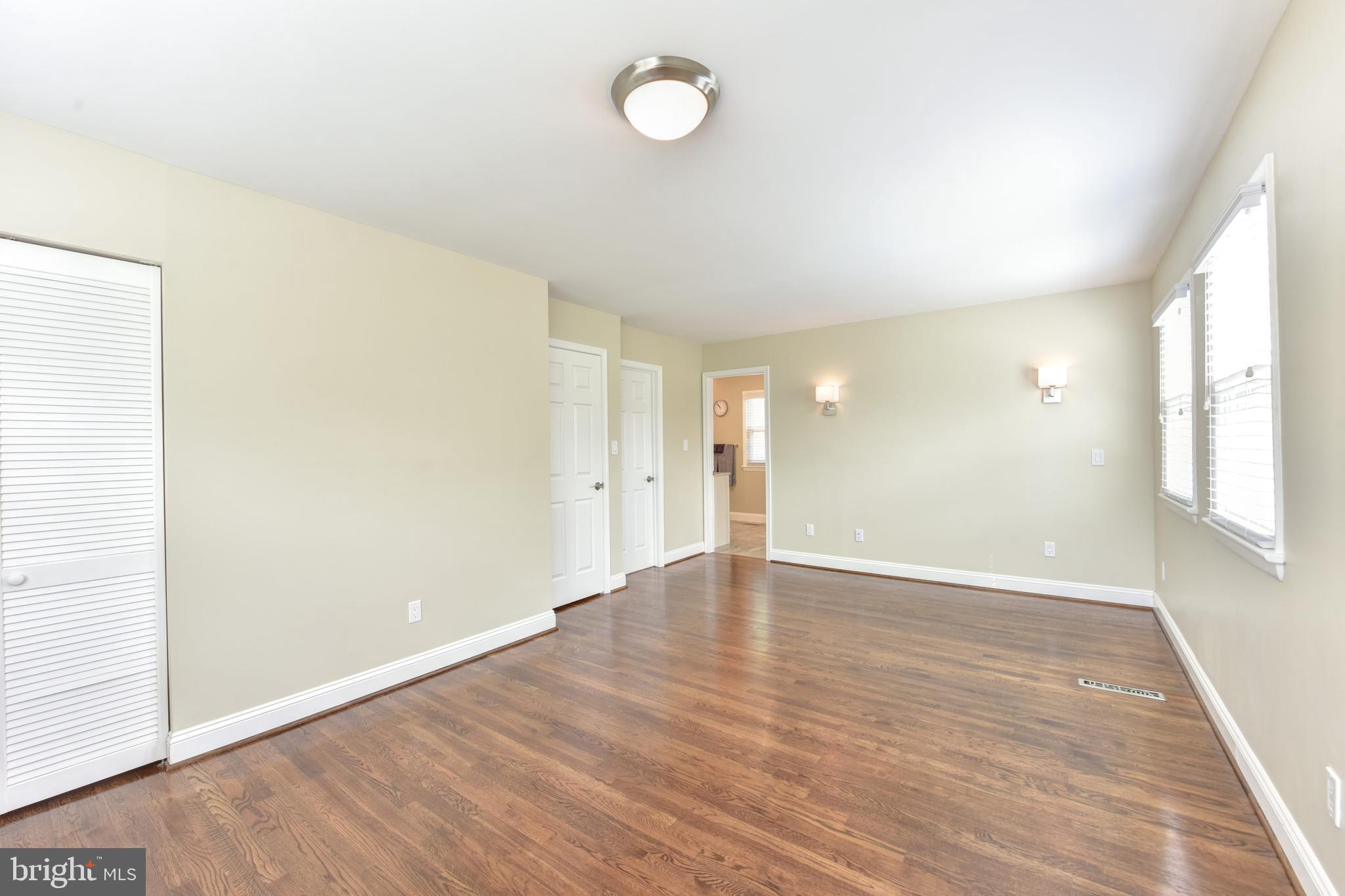 8332 Wagon Wheel Road Alexandria, VA 22309 - Photo 14 of 39 Master bedroom joined 2 bedrooms
