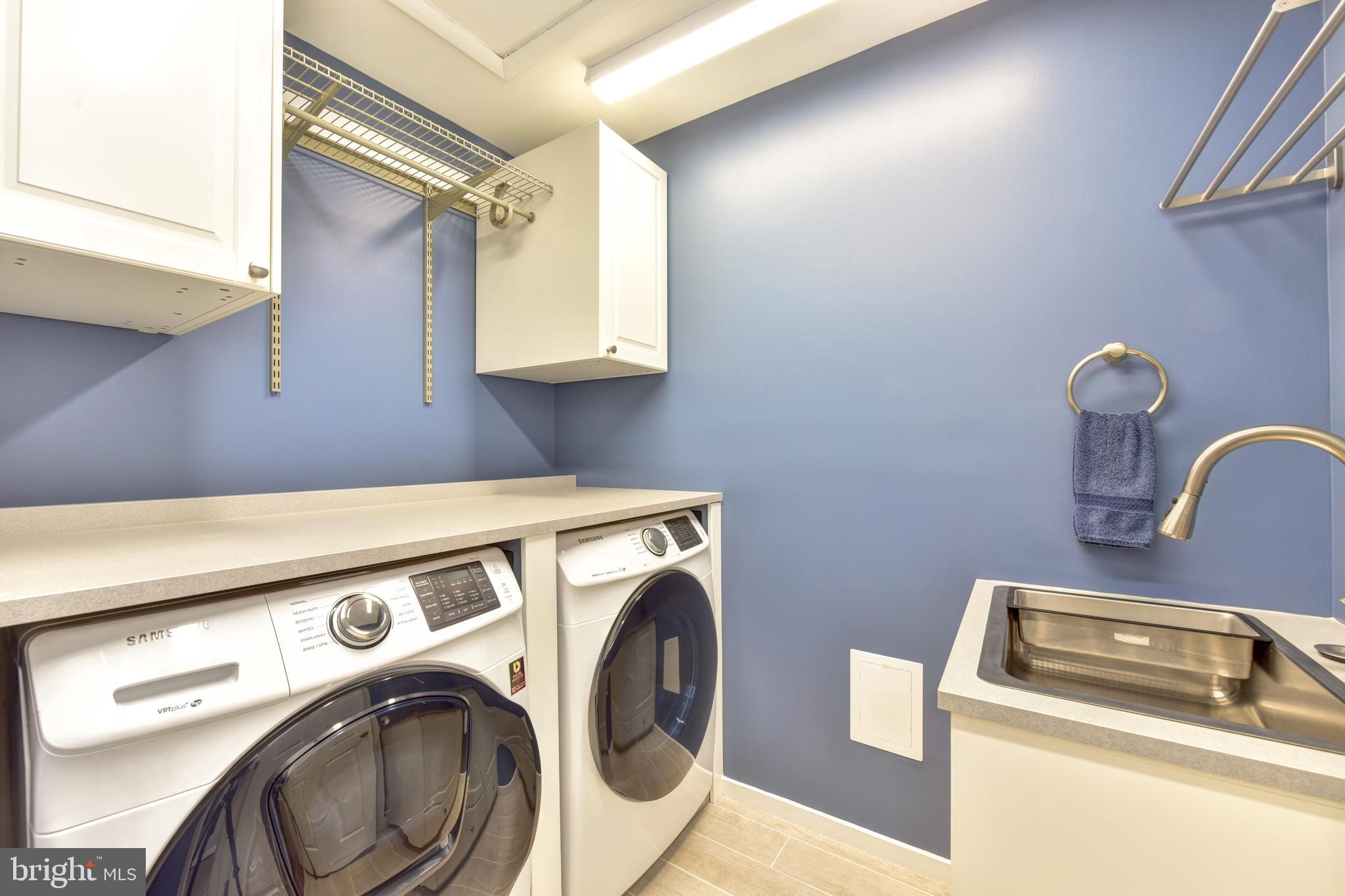 8332 Wagon Wheel Road Alexandria, VA 22309 - Photo 19 of 39 Washer/dryer on upper level with bedrooms