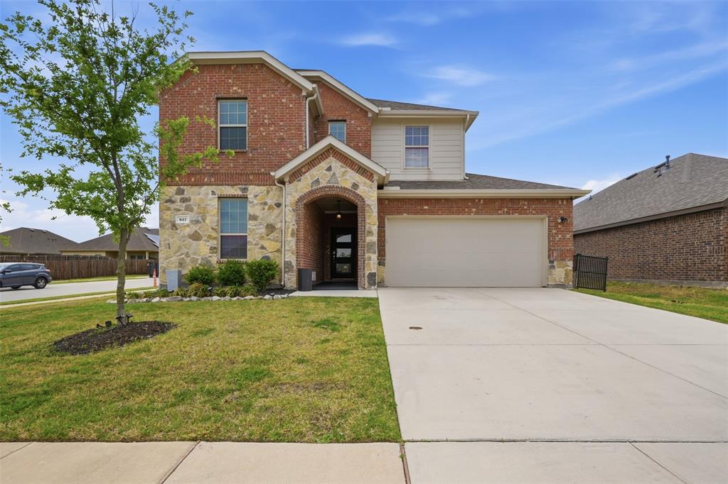 617 Range Drive Princeton, TX 75407 - Photo 1 of 26 a front view of a house with a yard