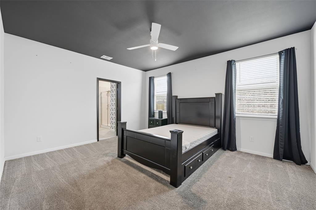 617 Range Drive Princeton, TX 75407 - Photo 12 of 26 a bed room with a bed and a window