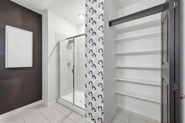 a view of a hallway with closet