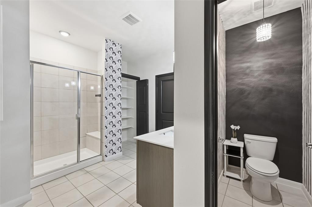 617 Range Drive Princeton, TX 75407 - Photo 15 of 26 a bathroom with a shower and a toilet