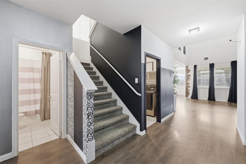 617 Range Drive Princeton, TX 75407 - Photo 20 of 26 a view of a hallway with staircase