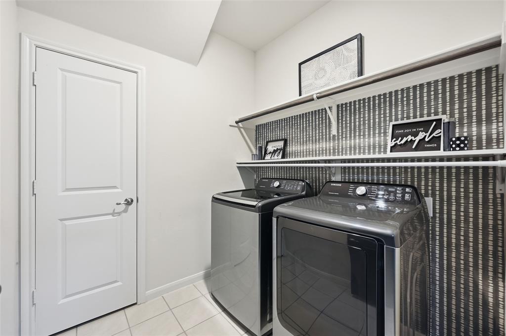 617 Range Drive Princeton, TX 75407 - Photo 24 of 26 a utility room with dryer and washer