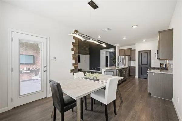 a view of a dining room with furniture