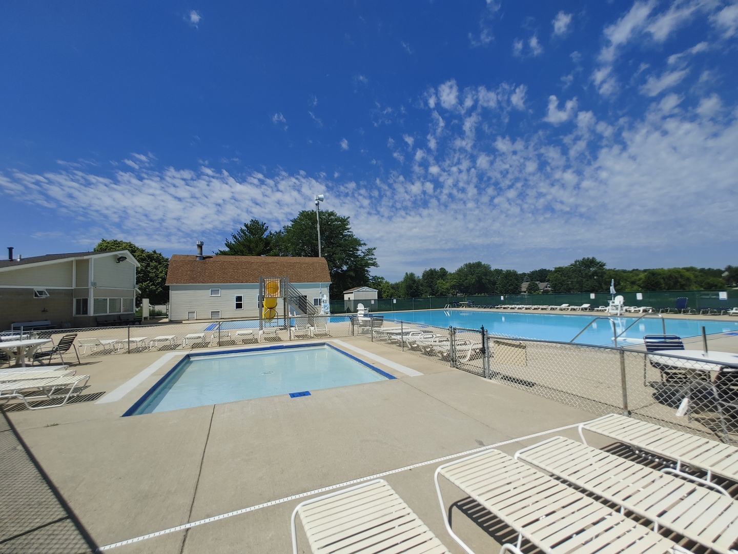 327 Rochester Road Northeast Poplar Grove, IL 61065 - Photo 15 of 20 a view of a swimming pool with a patio and a yard