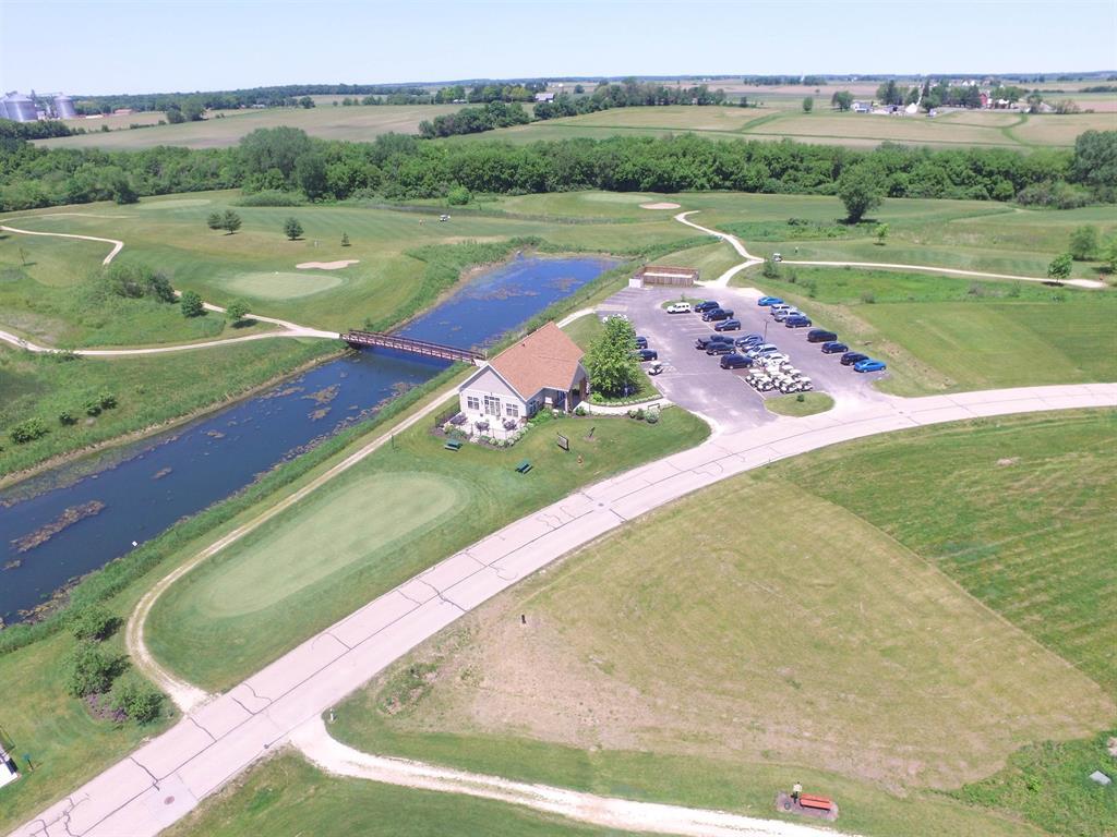 327 Rochester Road Northeast Poplar Grove, IL 61065 - Photo 19 of 20 a view of a lake with a big yard