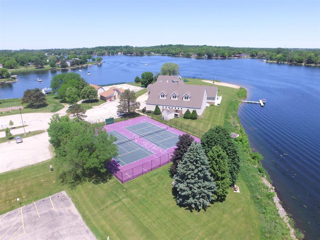 327 Rochester Road Northeast Poplar Grove, IL 61065 - Photo 9 of 20 an aerial view of a house with yard